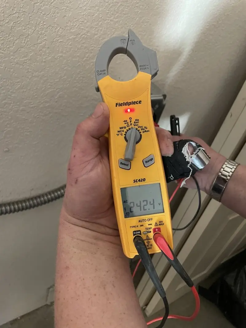 Voltage testing with clamp meter during Hot Tub / Pool Electrical Wiring in Valley Center